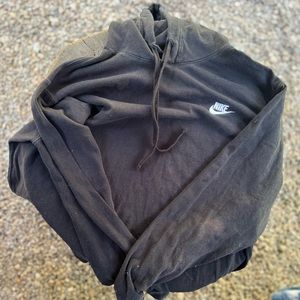 2 Men’s Medium Nike hoodies. Both have stains but no holes.